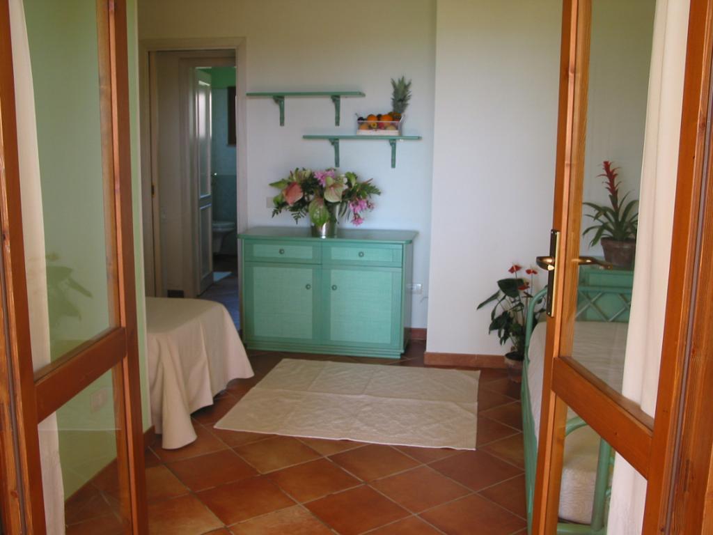 Villaggio Piscina Rei Monte Nai Room photo